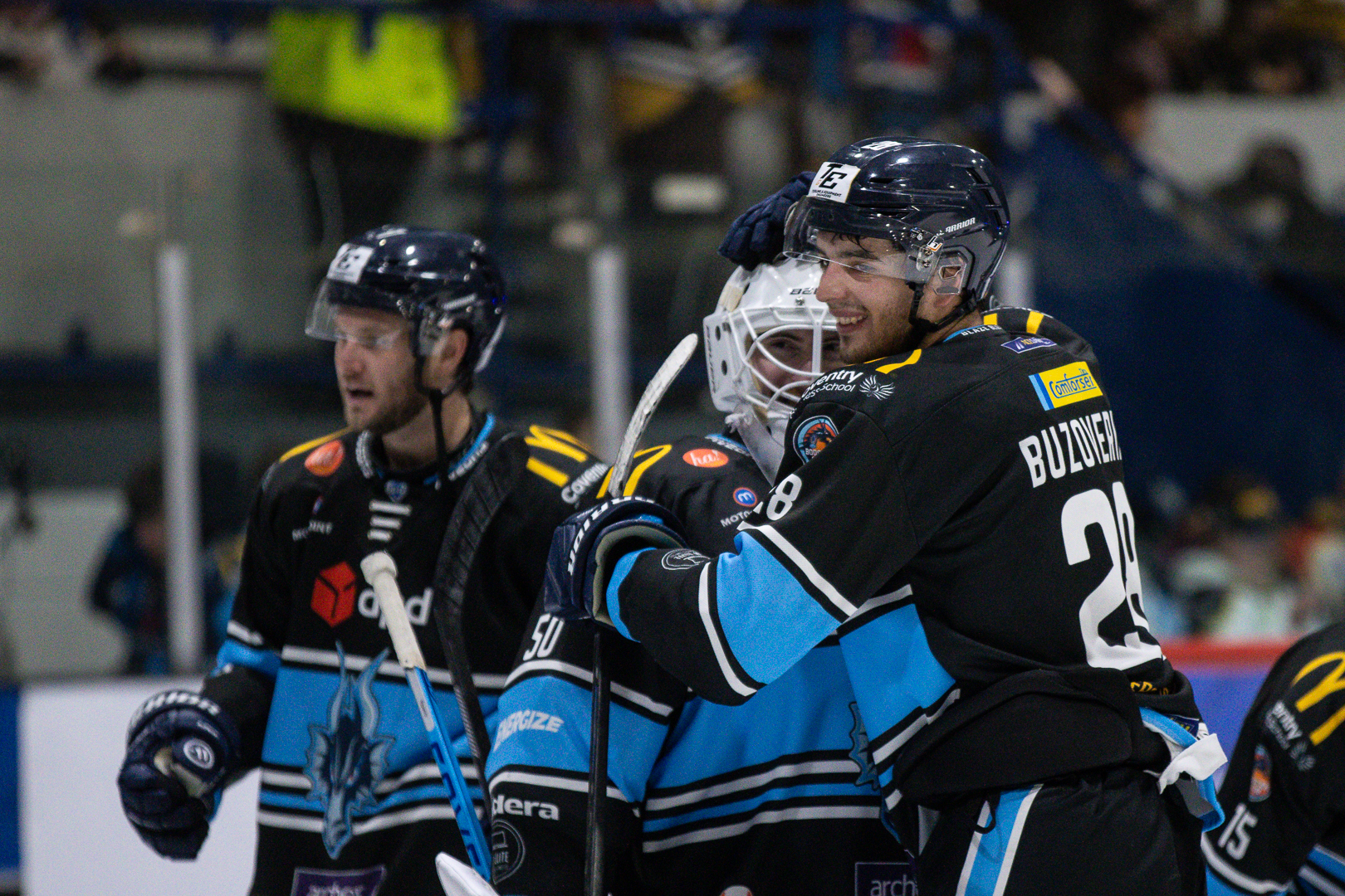 Blaze players celebrate a penalty shots victory 