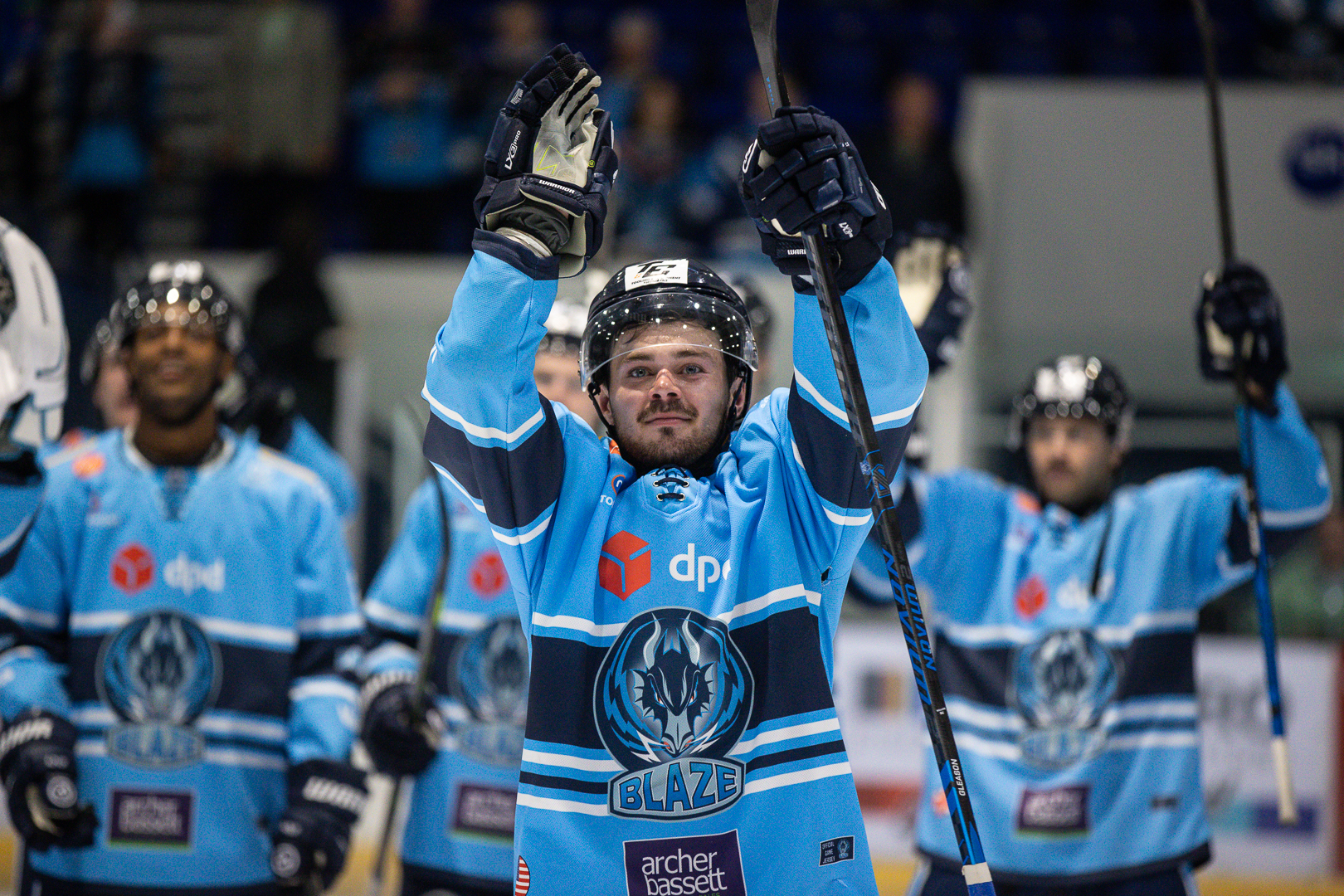 Matthew Gleason celebrates a Blaze win with the fans post-game 